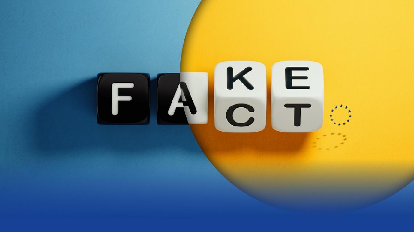 A mix of the words "Fake" and "Fact" compiled with letters on cubes